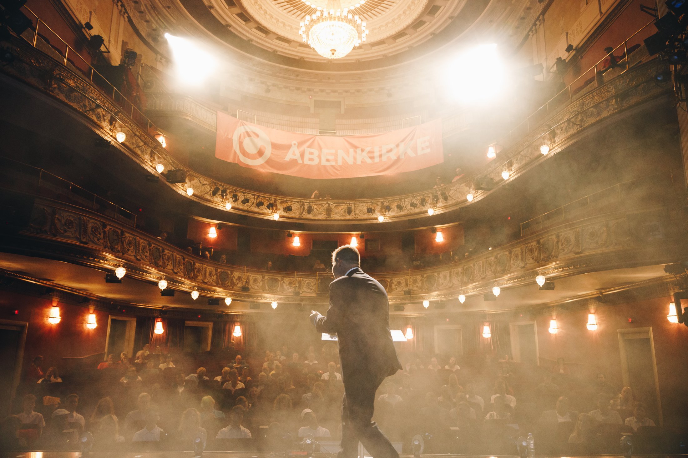 Thomas Christensen preaching on stage